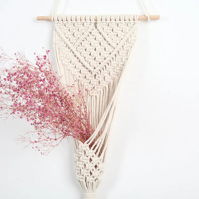 White hand-woven cotton flower basket wall tapestry with grid pattern measuring 30cm by 70cm