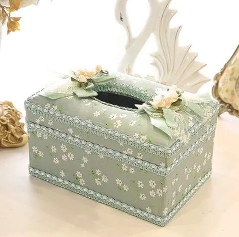 Ceramic tissue box with jewellery storage compartments for earrings and rings in bright apricot colour