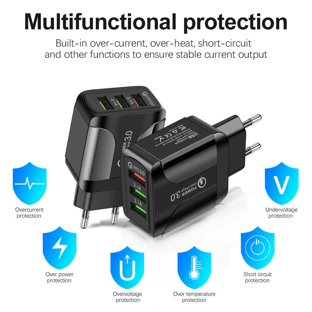 Black fast charge travel charger with 3 USB ports and a UK three-pin plug