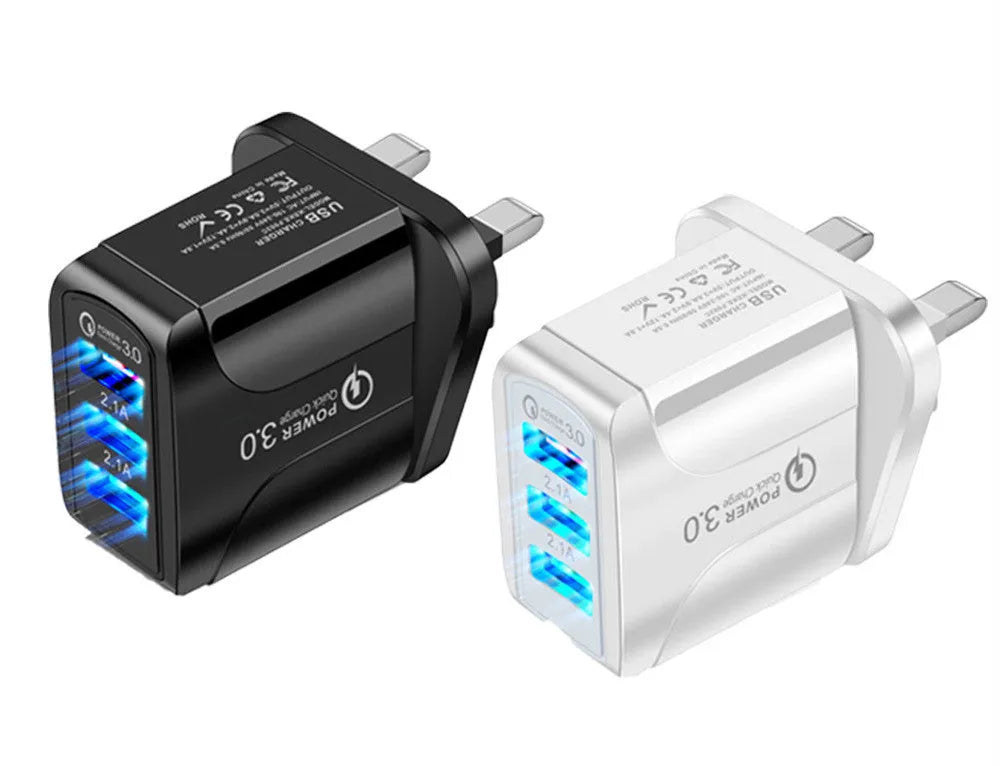 Black fast charge travel charger with 3 USB ports and a UK three-pin plug