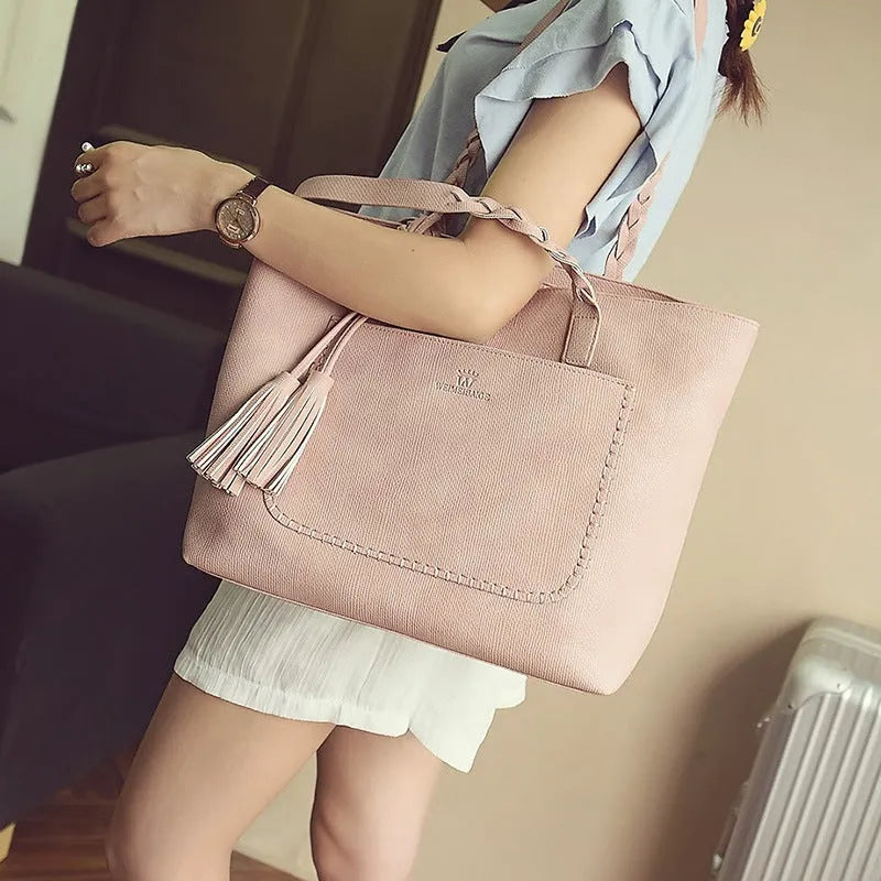 Women's tote shoulder bag with horizontal square shape, soft handle, hook closure, zipper pocket, and polyester lining in green.