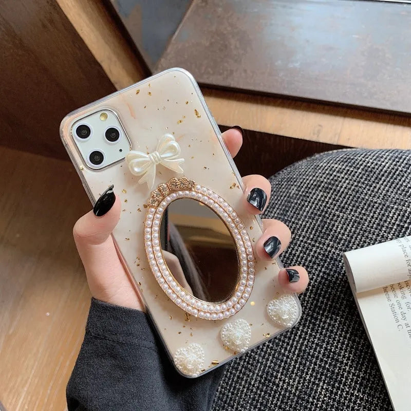 Brown marble pattern bowknot rhinestone decorative case for iPhone with a mirror back.