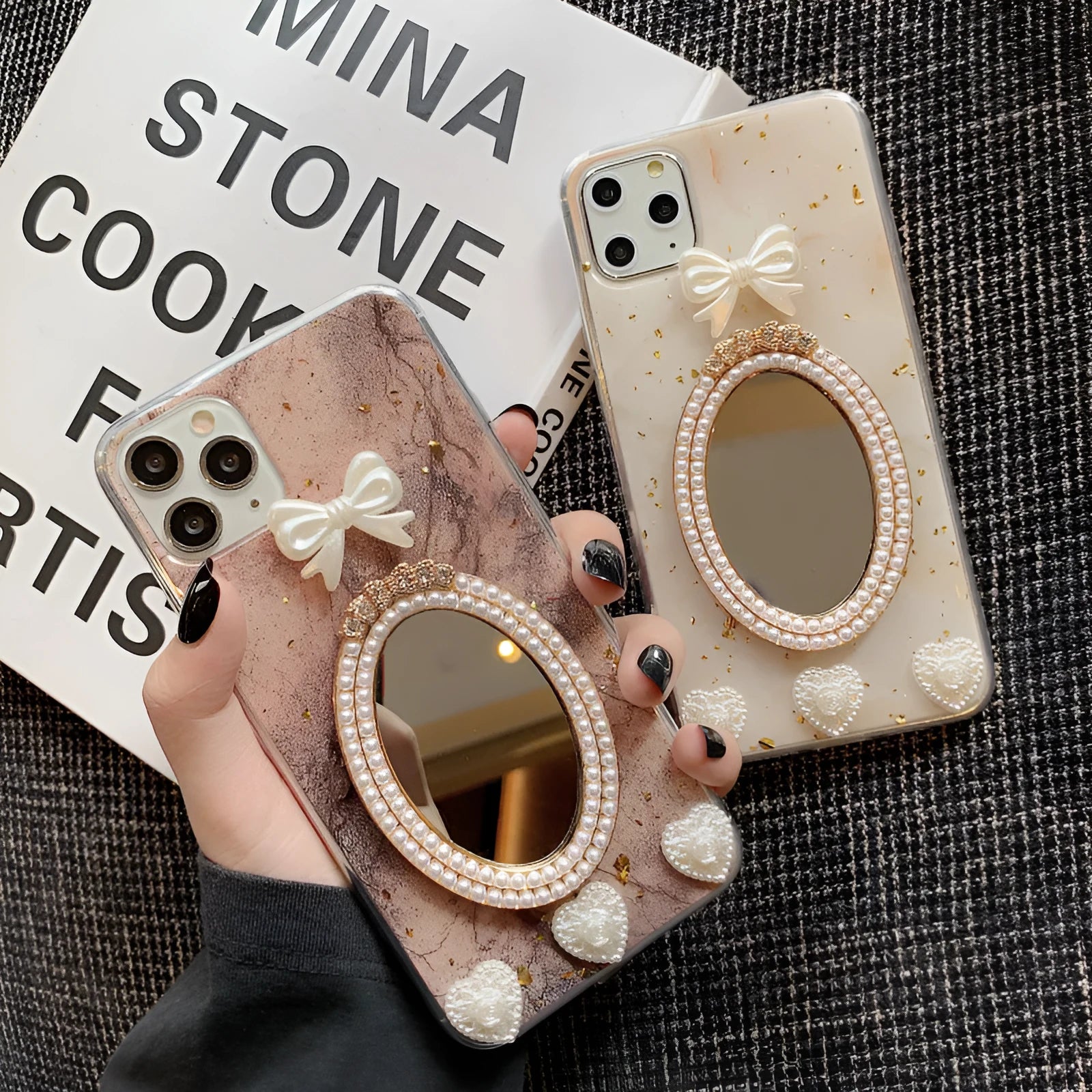 Brown marble pattern bowknot rhinestone decorative case for iPhone with a mirror back.