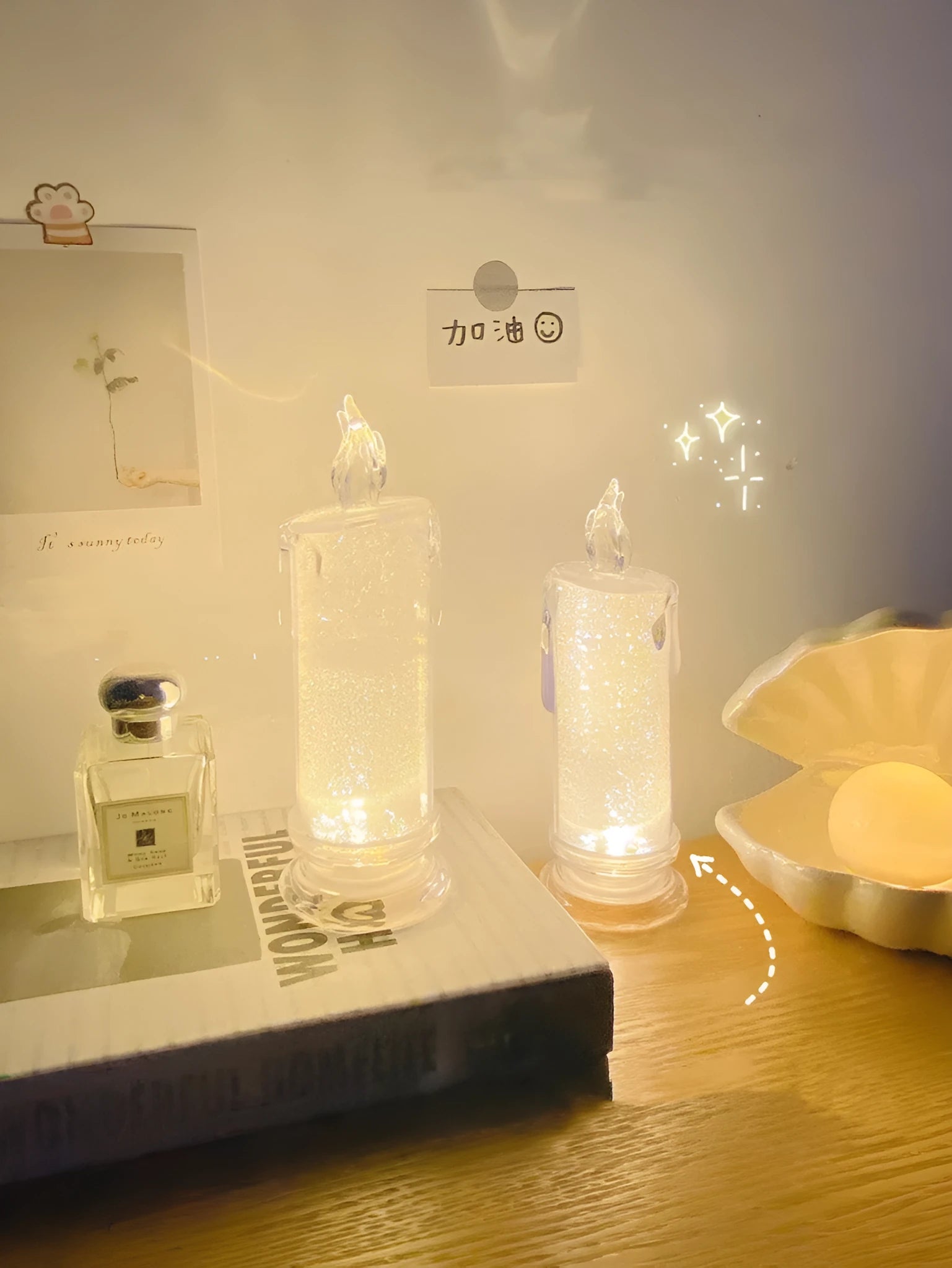 LED bedside lamp with a white message board and erasable pen next to it on a bedside table.