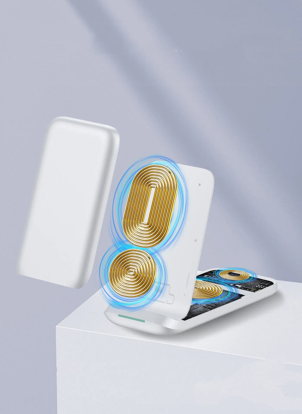 Black foldable three-in-one wireless charger open showing pads for two phones and an Apple Watch.