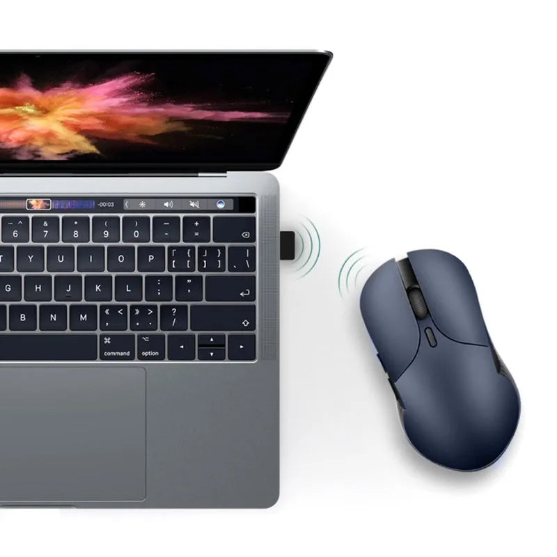 Blue wireless voice translation mouse with 15-metre range and rechargeable battery on desk