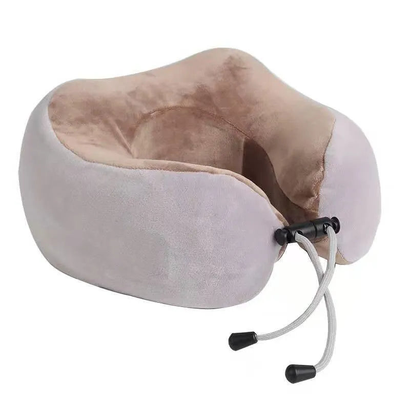 Brown U-shaped electric neck massage pillow on a grey background