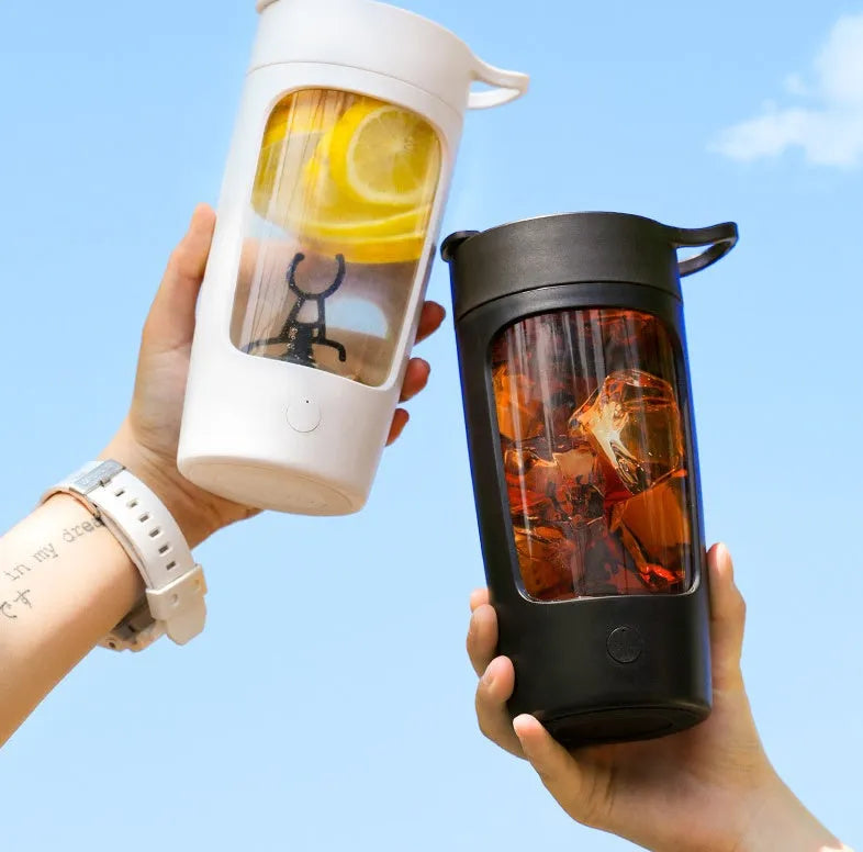 Portable rechargeable juice blender in white with 650ml mixing cup and compact dimensions.