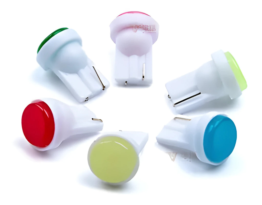 T10 wedge base LED bulb in six colours: white, blue, red, purple, yellow, green, showing compact size.