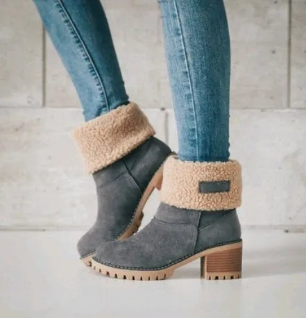 Mid-tube thick heel suede snow boots in black with round toe and low heel, showing wear-resistant soles