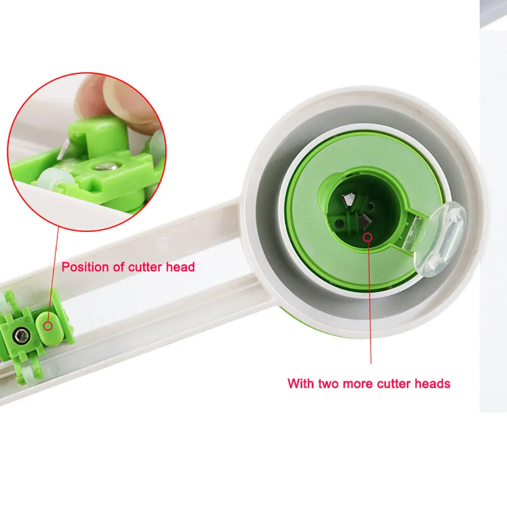 Orange or green plastic round paper cutter on a colour box, capable of cutting A3 paper.