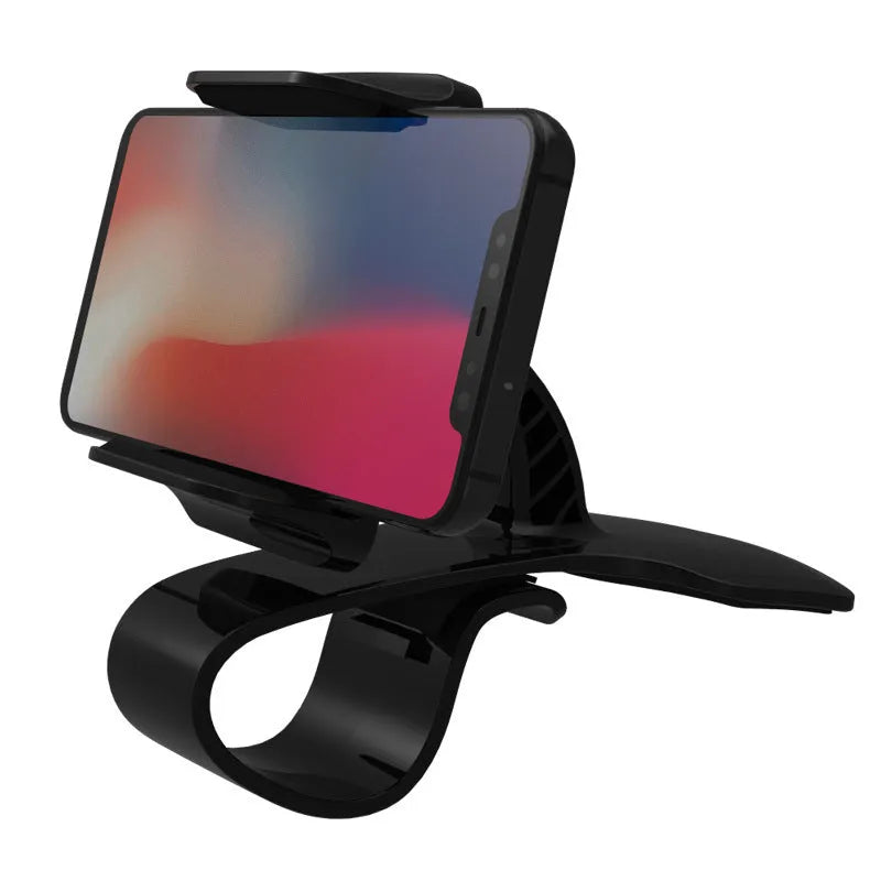 Dashboard car phone holder with black silicone grip mounted on vehicle dashboard edge