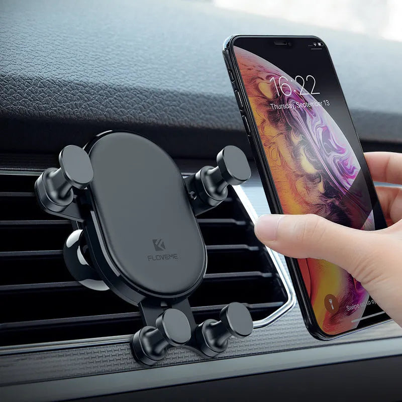 Black car air vent phone holder with 360-degree rotating bracket on a grey background.