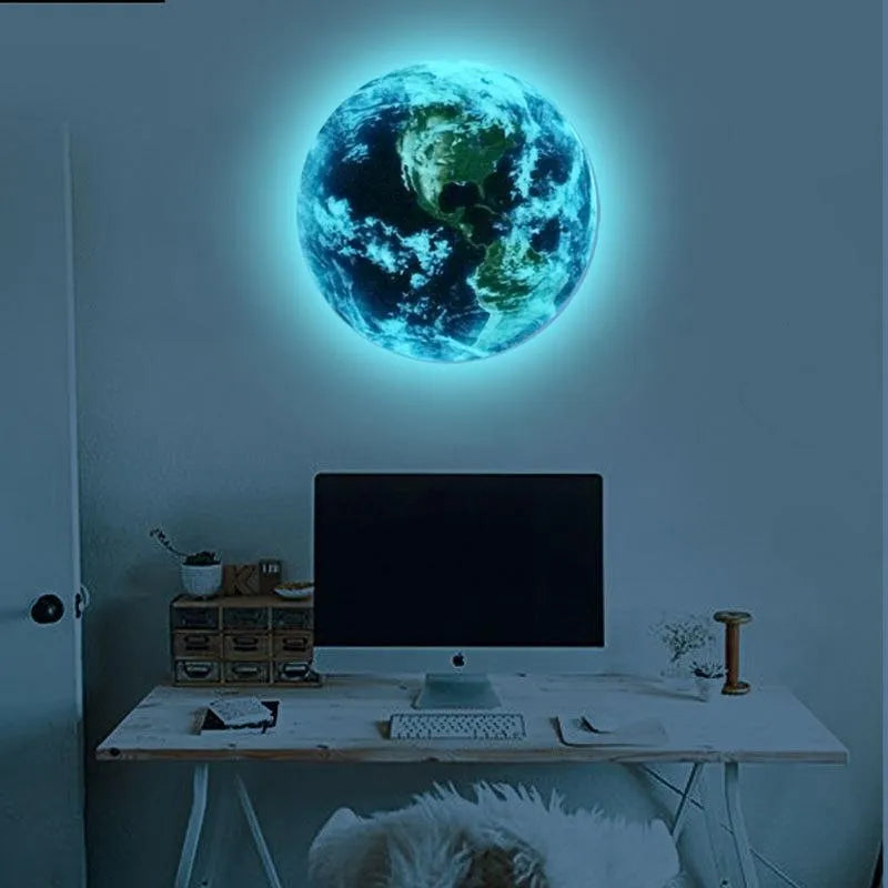 Glow in the dark 3D Earth wall sticker with self-adhesive backing, showing luminous effect in darkness