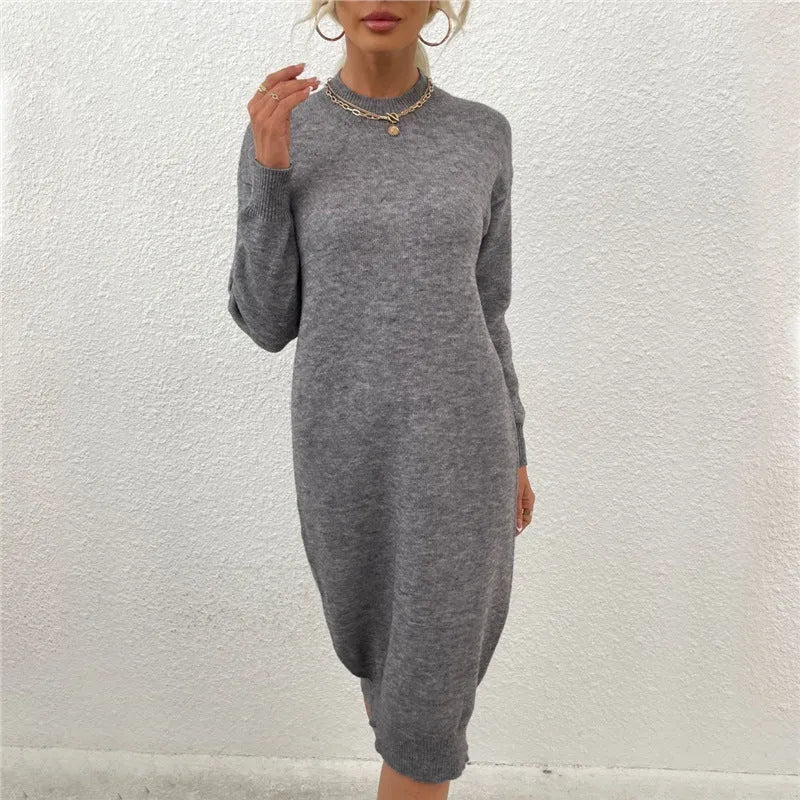 Women's grey crew neck acrylic sweater with long sleeves, shown in a pullover style.