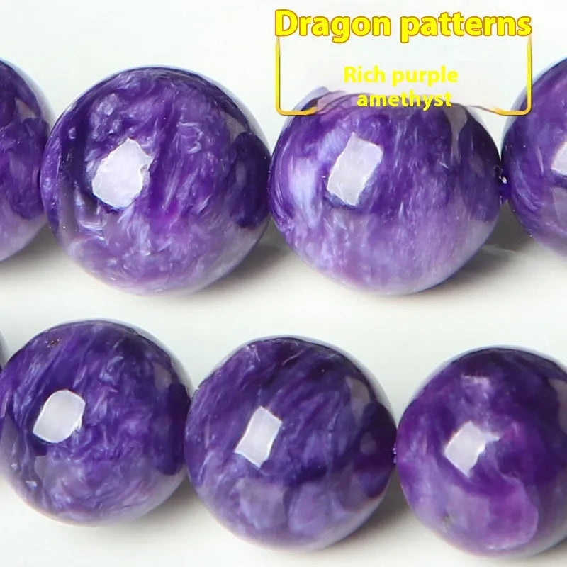 Natural transparent charoite crystal bracelet with platinum beads in 6mm, 8mm, 10mm, and 12mm sizes on wrist
