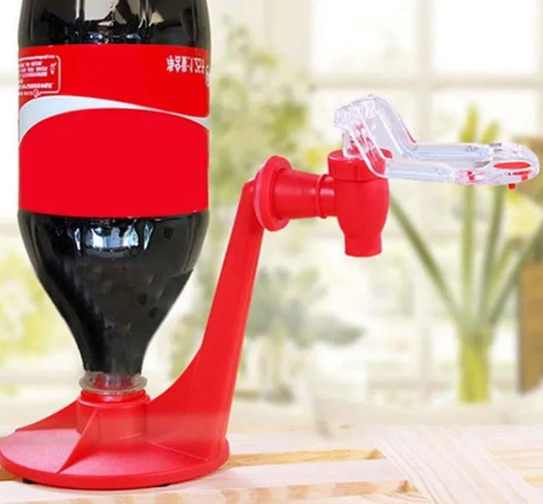 Red plastic Magic Tap soda dispenser for 2-litre bottles with push-in serving mechanism