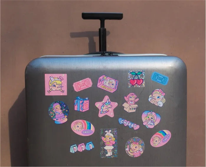 Set of 16 square Korean-style cute cartoon PVC stickers inside a transparent storage box.