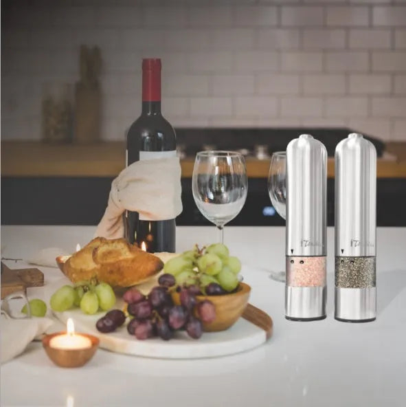 Stainless steel electric pepper grinder with natural colour finish