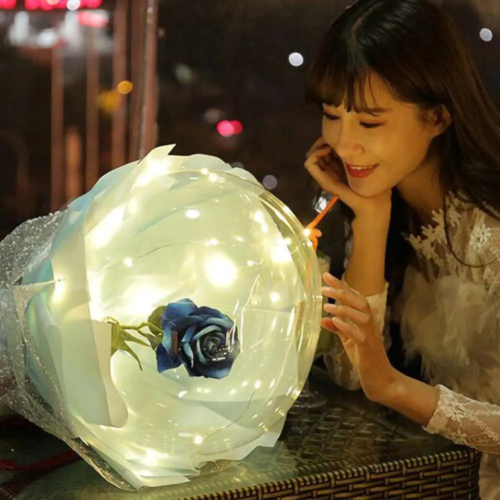 LED luminous balloon rose bouquet with transparent bobo ball design, artificial flowers, and LED lights for DIY Valentine's Day decorations