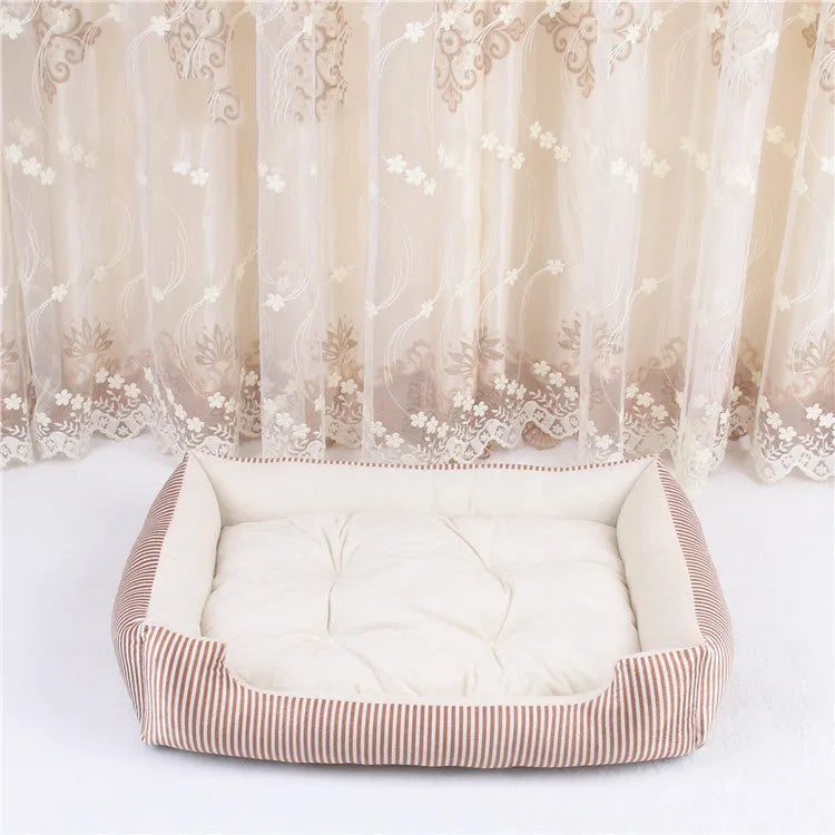 Washable cloth pet bed with cushioned sides shown in a striped colour option.