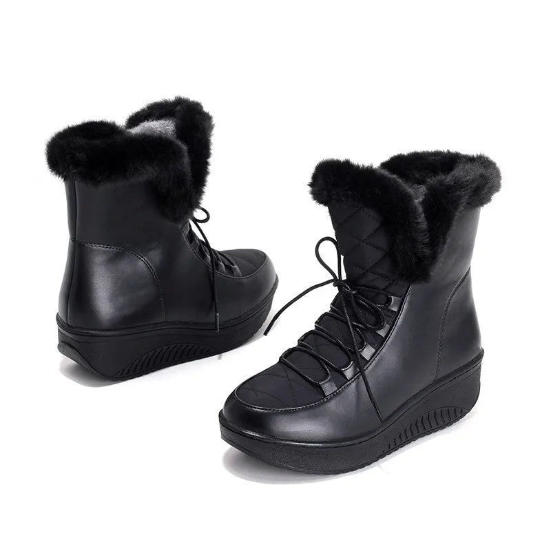 Women's black winter boots with 3cm platform, lace-up closure, and water-resistant PU leather construction