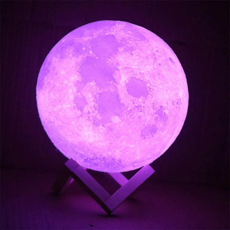 3D printed spherical moon lamp with visible surface contours and touch-sensitive metal ring at base