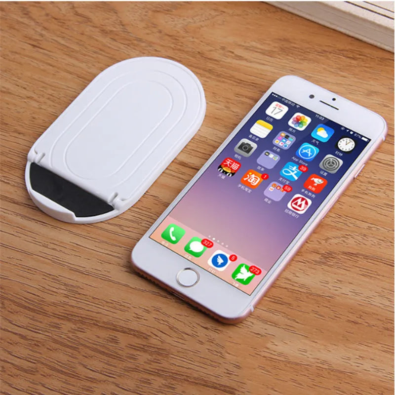 Mobile phone stand with lazy bracket design showing adjustable angles and six colour options