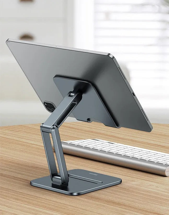 Deep space grey aluminium folding stand holding a tablet and a mobile phone on a desk.