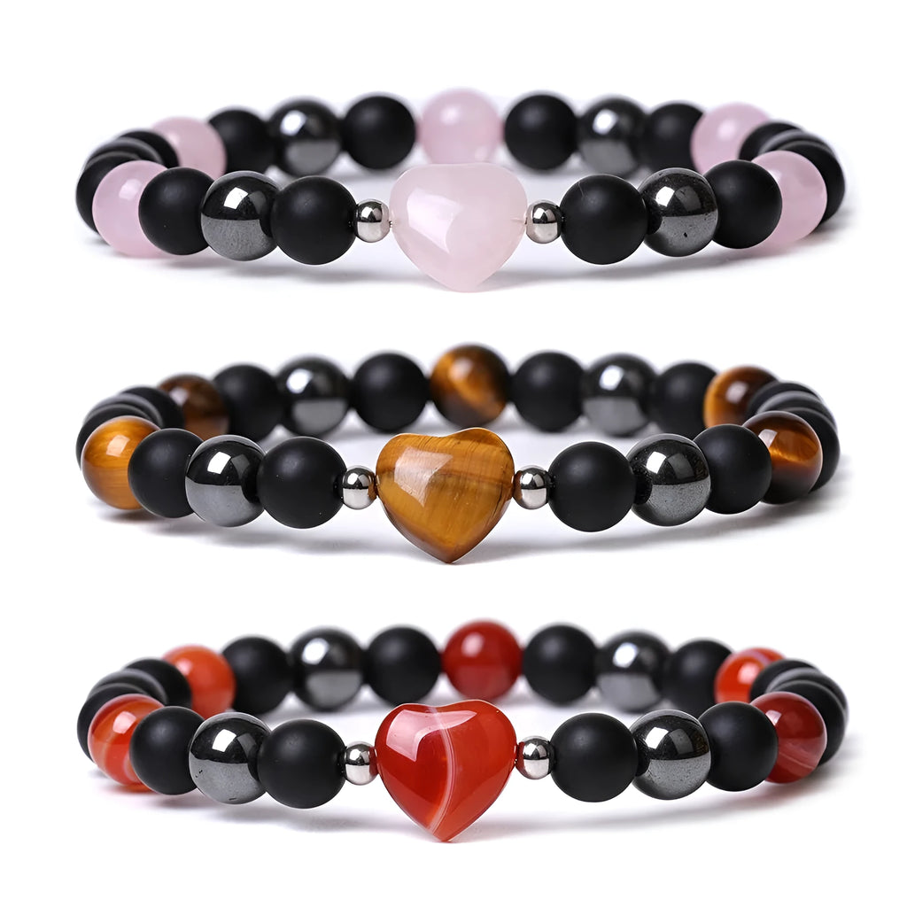 Hand-cut geometric peach heart bracelet in Tigereye stone with cosmic moon and planet elements