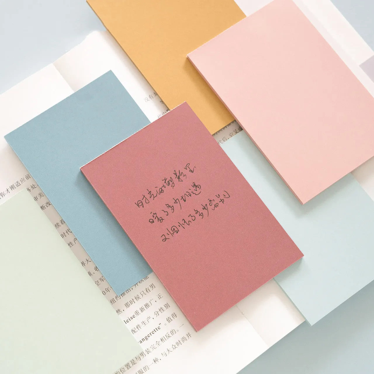 Pack of large 12cm x 8cm sticky notes in six different colours, 150 sheets total