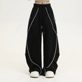 Black pleated wide-leg sports trousers with striped pattern and mid-waist design