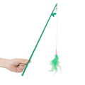 Green interactive cat wand toy with feather and bell attachments for stimulating play