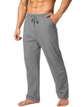 Men's loose-fitting grey casual trousers made from quick-drying polyester fabric.