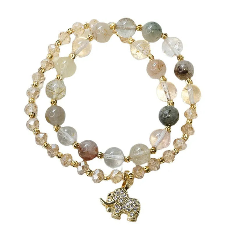 Women's retro bracelet with colour hair crystal and strawberry quartz stones in ethnic design