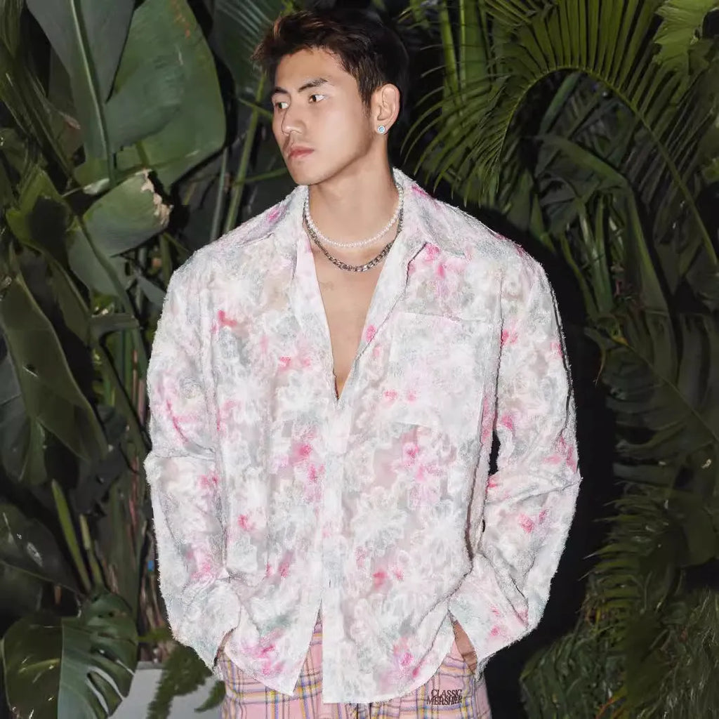 Men's pink floral long-sleeve shirt with embossed texture, loose fit, on hanger