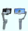 Folding L7B PRO three-axis mobile phone gimbal stabiliser shown in both unfolded and compact folded sizes.