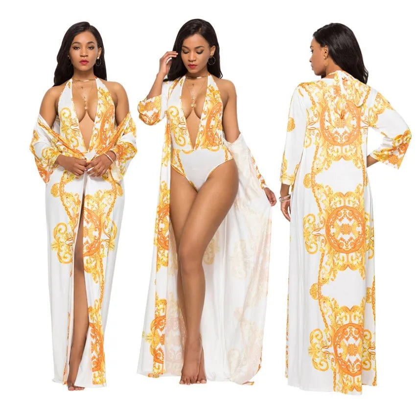 Printed cloak bikini in polyester, available in black or white, sizes M to 2XL