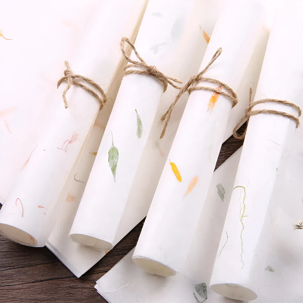 Ten sheets of Chinese ancient-style painting paper in green, red, and yellow designs, measuring 27.5 by 16.7 cm