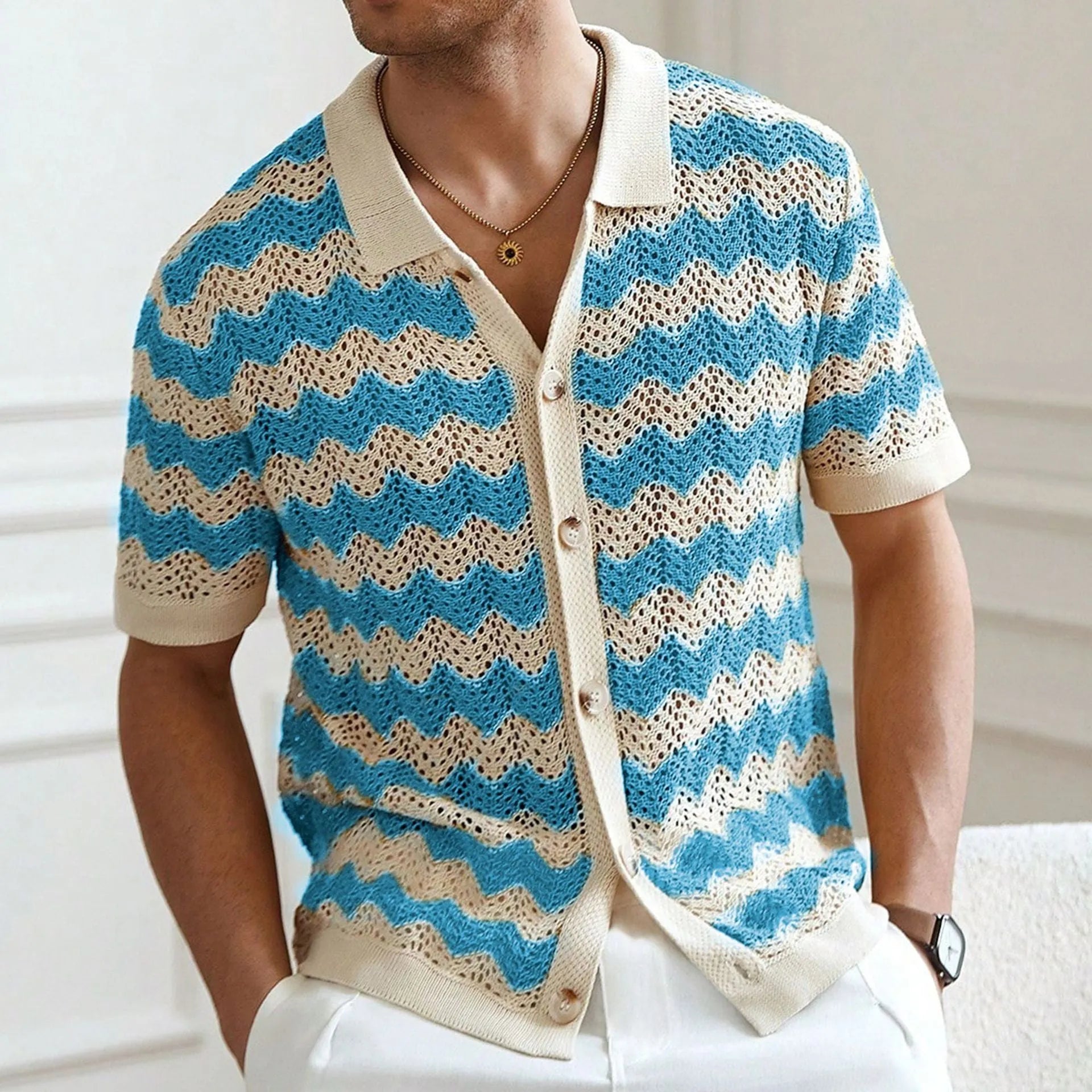 American-style hollow jacquard corrugated sweater with flocking detail in blue, showing short sleeves and textured fabric
