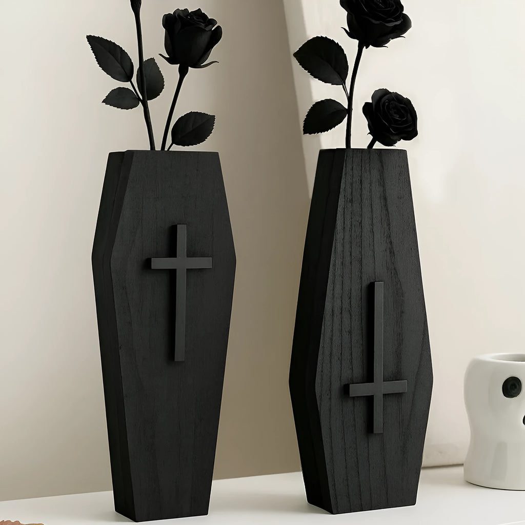 Black cross-shaped wooden wall shelf measuring 27 by 9 centimetres