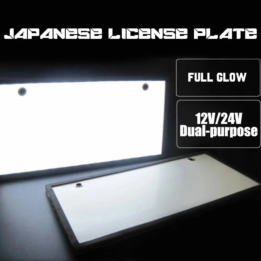 A pair of black plastic LED licence plate light bars for trucks on a white background.