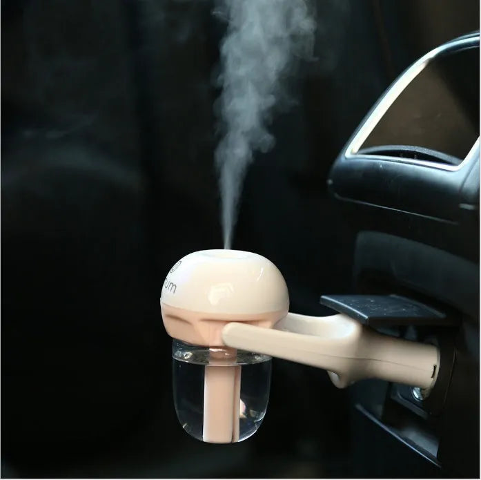 Compact car humidifier with 180-degree rotation nozzle in blue colour, showing ≤380ml/h capacity and 5W power specifications