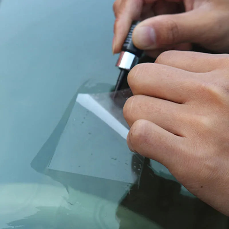 Yellow three-piece car windshield repair kit with glass repairing liquid