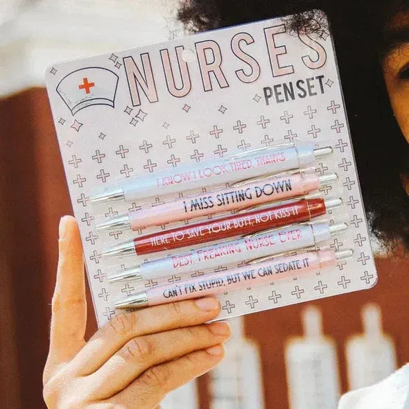 Five nurse theme ballpoint pens with humorous decoration arranged together