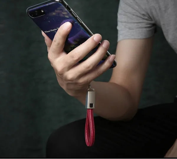 Short leather-wrapped USB-C to Lightning charging cable in black, brown, or red colour with zinc alloy connector