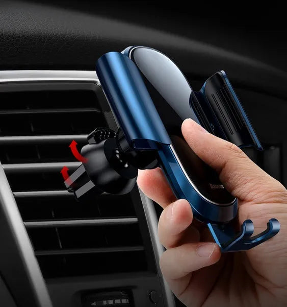 Smart car bracket with rotating ball head mounted on car air vent holding smartphone