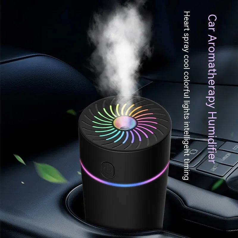 USB car mini humidifier with aromatherapy function in black or white, showing compact design for vehicle use