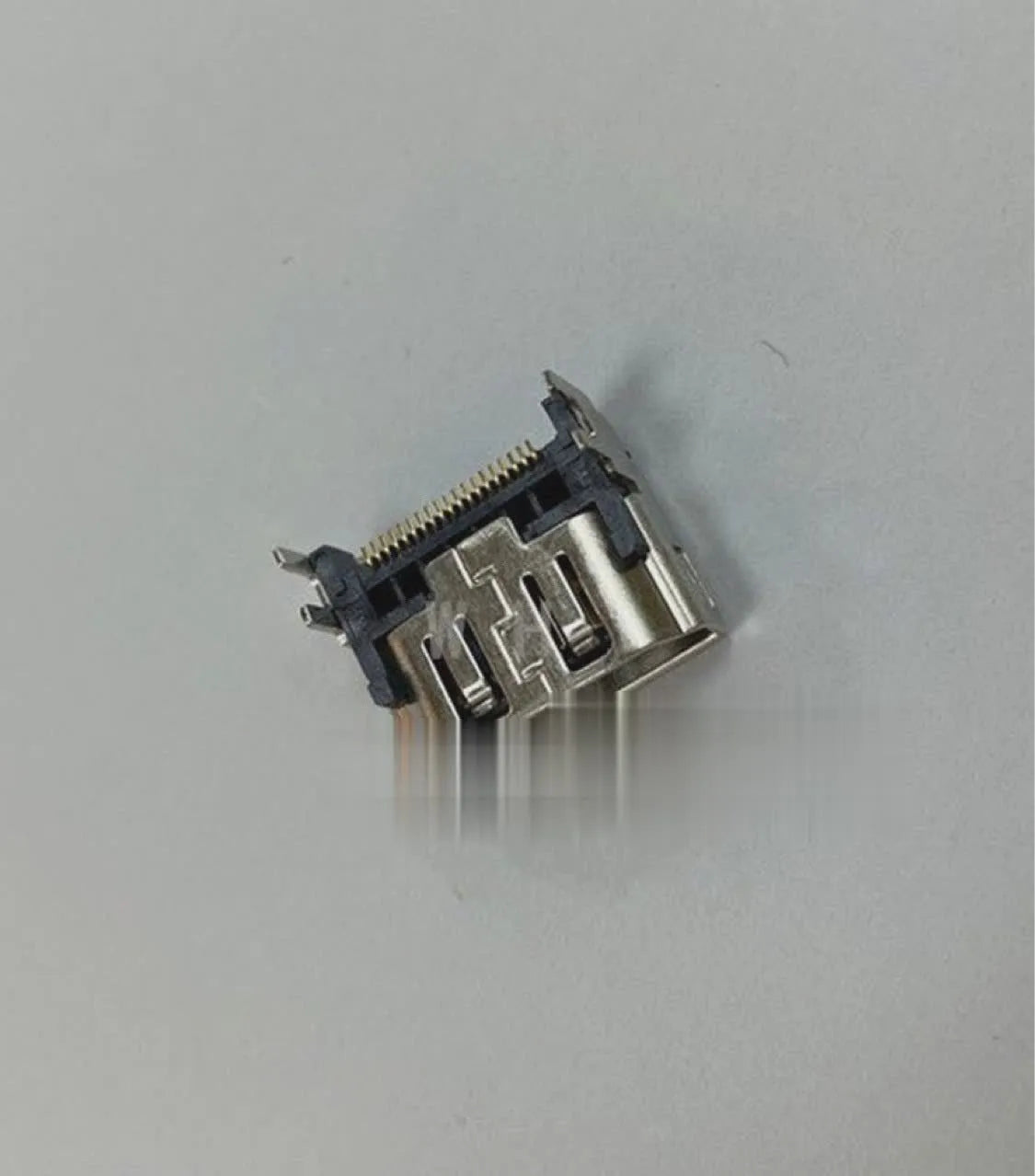 Silver HDMI interface host socket with 19-pin configuration for digital signal transmission