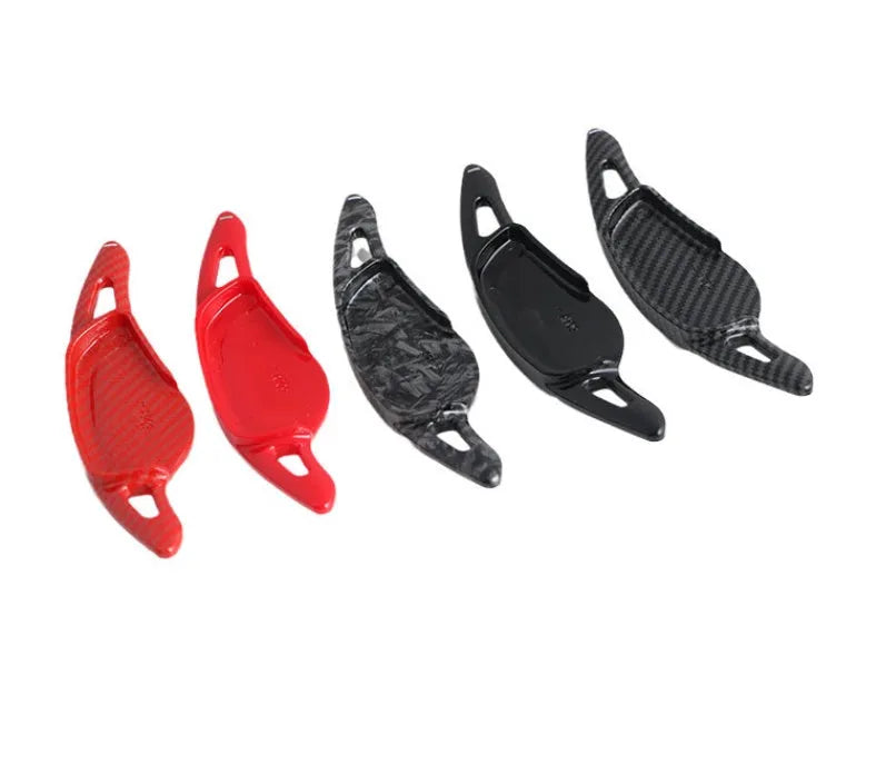 Car steering wheel paddle shifter modification in carbon fibre black finish on ABS plastic